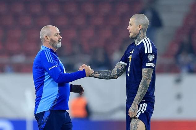 Scotland manager Steve Clarke (left) and Lyndon Dykes of Scotland after their side s defeat Greece v Scotland, FIFA 2026 World Cup Qualifying, Group C, Football, Georgios Karaiskakis Stadium, Athens, Greece - 15 Nov 2025Athens Georgios Karaiskakis Stadium Greece EDITORIAL USE ONLY No use with unauthorised audio, video, data, fixture lists, club league logos or live services. Online in-match use limited to 120 images, no video emulation. No use in betting, games or single club league player publications. Copyright: xGeorgexTewkesbury Shutterstockx 15786154ea