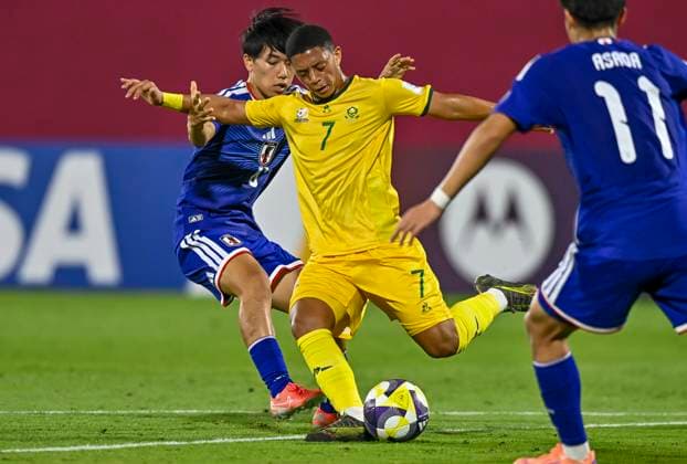 Japan v South Africa: Round of 32- FIFA U-17 World Cup Qatar 2025 Rento Noguchi of Japan and Selwyn Stevens of South Africa in action during the FIFA U-17 World Cup Qatar 2025 Round of 32 match between Japan and South Africa in Doha, Qatar, on November 15, 2025. DOHA Qatar Copyright: xNOUSHADxTHEKKAYILx
