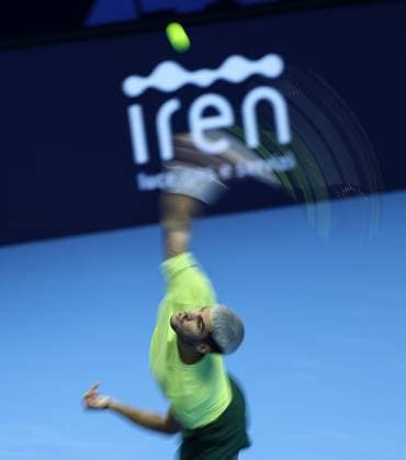 (251116) -- TURIN, Nov. 16, 2025 -- Carlos Alcaraz serves during the men s singles semifinal match between Carlos Alcaraz of Spain and Felix Auger-Aliassime of Canada at the ATP, Tennis Herren Finals tennis tournament in Turin, Italy, on Nov. 15, 2025. ) (SP) ITALY-TURIN-ATP FINALS-MEN S SINGLES-SEMIFINAL LixJing 