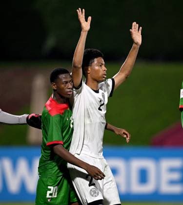 Football, Junior U 17 World Cup 2025 Doha Qatar Round of 16 15 11 2025 Match 83 Germany Burkina Faso Alassana Bagayogo left, Burkina Faso against Nebe Sirak Domnic right, Germany