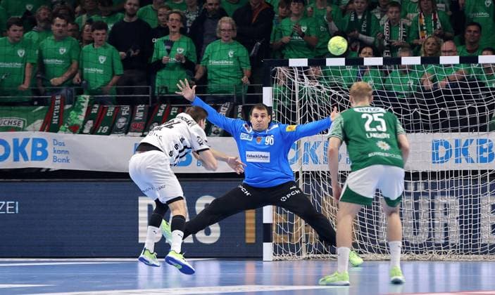 Goalkeeper Dejan Milosavljev saves against Lukas Zerbe duel Game scene Action Sport Handball HBL Bundesliga Men 12 Matchday Season 2025 2026 15 11 2025 Füchse Berlin vs THW Kiel