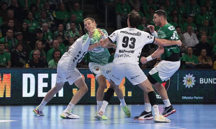 Magnus Landin Jacobsen, Mathias Gidsel on the ball, Veron Nacinovic, Mijajlo Marsenic duel Match scene Action Sport Handball HBL Bundesliga Men 12 Matchday Season 2025 2026 15 11 2025 Füchse Berlin vs THW Kiel