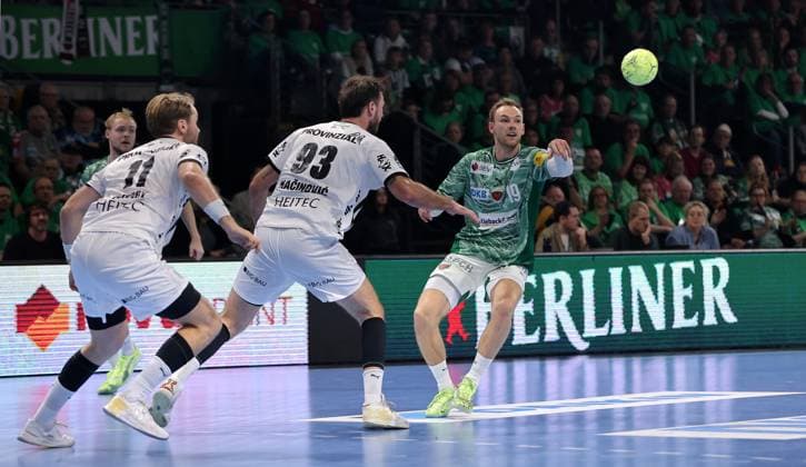 Petter Overby, Veron Nacinovic, Mathias Gidsel on the ball duel Game scene Action Sport Handball HBL Bundesliga Men 12 Matchday Season 2025 2026 15 11 2025 Füchse Berlin vs THW Kiel