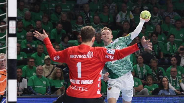 Mathias Gidsel scores a goal against goalkeeper Gonzalo Perez de Vargas duel Game scene Action Sport Handball HBL Bundesliga Men 12 Matchday Season 2025 2026 15 11 2025 Füchse Berlin vs THW Kiel