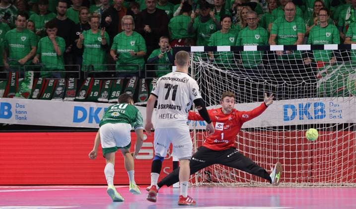 Tim Freihöfer scores a goal against goalkeeper Gonzalo Perez de Vargas duel Game scene Action Sport Handball HBL Bundesliga Men 12 Matchday Season 2025 2026 15 11 2025 Füchse Berlin vs THW Kiel