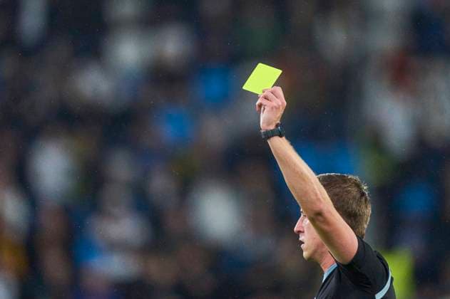 referee John Brooks with whistle, gestures, shows, watch, individual action, Schiedsrichter, Hauptschiedsrichter, schiri, Pfeiffe, Pfiff, shows the Yellow Card to in the FIFA World Cup, WM, Weltmeisterschaft, Fussball 2026 qualifier match LUXEMBOURG - GERMANY 0-2 in Season 2025 2026 at November 14, 2025 in Luxemburg.
