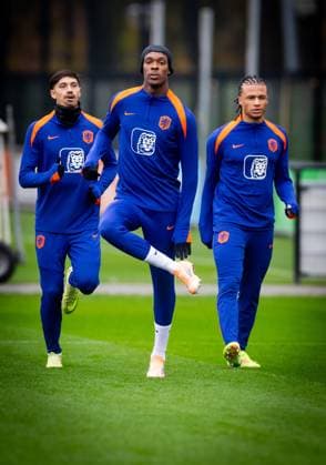 ZEIST - From left to right: Tiijani Reijnders, Emanuel Emegha, and Nathan AkÃ during the Dutch national football team s training session at the KNVB Campus, ahead of the World Cup qualifier against Lithuania. ANP IRIS VAN DEN BROEK xVIxANPxSportx xxANPxIVx 542246659 originalFilename: 542246659.jpg