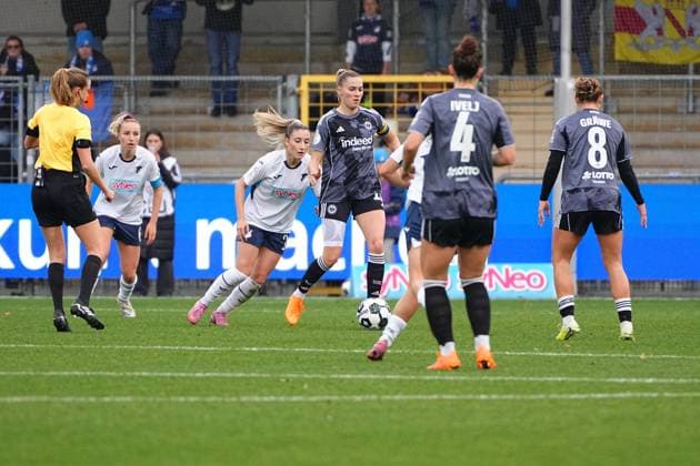 Laura Freigang 10 Eintracht Frankfurt with ball, while Vanessa Diehm 6 TSG Hoffenheim Women , Janna Grimm 26 TSG Hoffenheim Women and Lisanne Gräwe 8 Eintracht Frankfurt defend Womens DFB Cup TSG Hoffenheim against Eintracht Frankfurt, at Dietmar Hopp Stadium in Hoffenheim possession and defense Copyright: xspeedshotx