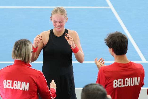a Belgian Jeline Vandromme celebrates after winning a tennis match against German Friedsam, during the meeting between Belgium and Germany in the Billie Jean King Cup Play-offs, on Sunday 16 November 2025 in Ismaning, Germany. PHOTO BENOITxDOPPAGNE  x141986442x