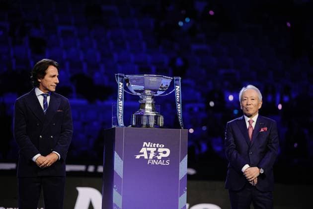 Nitto s AD Hideo Takasaki on the right of the trophy after the doubles final match and the ATP, Tennis Herren Finals at the Inalpi Arena in Turin, Italy - Sunday, Nov. 16, 2025. -  Copyright: xMarcoxAlpozzi LaPressex