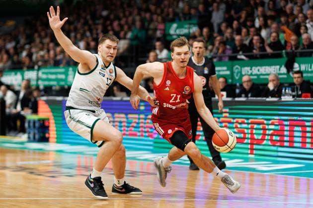Marten Linssen Gladiators Trier in duel with Justus Hollatz FC Bayern Basketball , Vet Concept Gladiators Trier vs FC Bayern Basketball, Basketball, BBL Pokal, Quarterfinals, Season 2025 2026, 16 11 2025 Vet Concept Gladiators Trier vs FC Bayern Basketball, Basketball, BBL Pokal, Quarterfinals, Season 2025 2026, 16 11 2025 Copyright: xEibner-Pressefoto AlexanderxNeisx EP_ANS