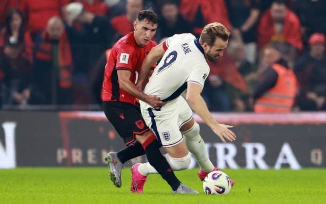 Qazim Laci of Albania and Harry Kane of England. Albania v England, FIFA 2026 World Cup Qualifying, Group K, Football, Arena Kombetare, Tirana, Albania - 16 Nov 2025Tirana Arena Kombetare Albania EDITORIAL USE ONLY No use with unauthorised audio, video, data, fixture lists, club league logos or live services. Online in-match use limited to 120 images, no video emulation. No use in betting, games or single club league player publications. Copyright: xNikolaxKrstic Shutterstockx 15786244ar