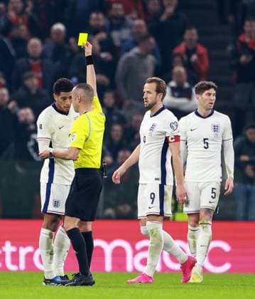 Jude Bellingham of England is shown a yellow card. Albania v England, FIFA 2026 World Cup Qualifying, Group K, Football, Arena Kombetare, Tirana, Albania - 16 Nov 2025Tirana Arena Kombetare Albania EDITORIAL USE ONLY No use with unauthorised audio, video, data, fixture lists, club league logos or live services. Online in-match use limited to 120 images, no video emulation. No use in betting, games or single club league player publications. Copyright: xNikolaxKrstic Shutterstockx 15786244cu