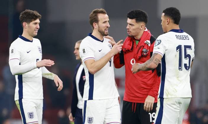Harry Kane of England and Mirlind Daku of Albania at full time. Albania v England, FIFA 2026 World Cup Qualifying, Group K, Football, Arena Kombetare, Tirana, Albania - 16 Nov 2025Tirana Arena Kombetare Albania EDITORIAL USE ONLY No use with unauthorised audio, video, data, fixture lists, club league logos or live services. Online in-match use limited to 120 images, no video emulation. No use in betting, games or single club league player publications. Copyright: xNikolaxKrstic Shutterstockx 15786244dq