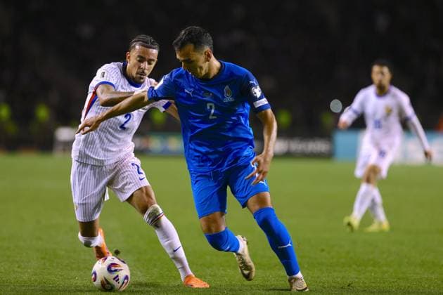 Azerbaijan v France - FIFA World Cup, WM, Weltmeisterschaft, Fussball European Qualifiers BAKU, AZERBAIJAN - NOVEMBER 16: Rahman Dashdamirov (2) of Azerbaijan in action against Malo Gusto of France during the 2026 FIFA World Cup European Qualifiers match between Azerbaijan and France on November 16, 2025 in Baku, Azerbaijan. Resul Rehimov Anadolu Baku Azerbaijan. Editorial use only. Please get in touch for any other usage.  Copyright: x2025xAnadoluxResulxRehimovx