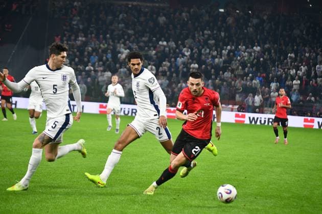 Albania v England - FIFA World Cup, WM, Weltmeisterschaft, Fussball European Qualifiers TIRANA, ALBANIA — NOVEMBER 16: Albania’s Arber Hoxha (21) battles for the ball against England’s John Stones (5) and Jarell Quansah (2) during the 2026 FIFA World Cup European Qualifiers match between Albania and England at the National Arena in Tirana, Albania on November 16, 2025. Olsi Shehu Anadolu Tirana Albania. Editorial use only. Please get in touch for any other usage.  Copyright: x2025xAnadoluxOlsixShehux