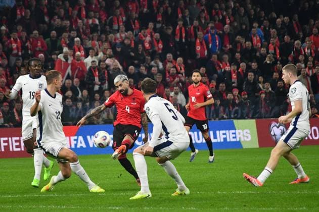 Albania v England - FIFA World Cup, WM, Weltmeisterschaft, Fussball European Qualifiers TIRANA, ALBANIA — NOVEMBER 16: Albania’s Elseid Hysaj (4) battles for the ball against England’s John Stones (5) and Dan Burn during the 2026 FIFA World Cup European Qualifiers match between Albania and England at the National Arena in Tirana, Albania on November 16, 2025. Olsi Shehu Anadolu Tirana Albania. Editorial use only. Please get in touch for any other usage.  Copyright: x2025xAnadoluxOlsixShehux
