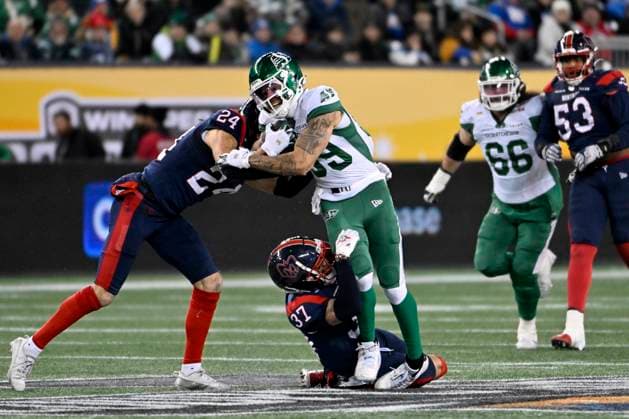 November 16, 2025, Winnipeg, Mb, CANADA: Montreal Alouettes Marc-Antoine Dequoy (24) and teammate Wesley Sutton (37) team up to take down Saskatchewan Roughriders Kian Schaffer-Baker (89) during first half CFL football action at the 112th Grey Cup, in Winnipeg on Sunday, Nov. 16, 2025. Canada News - November 16, 2025  - ZUMAc35_ 20251116_zaf_c35_096 Copyright: xFredxGreensladex