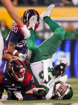 November 17, 2025, Winnipeg, Mb, CANADA: Saskatchewan Roughriders A.J. Ouellette (45) is upended by Montreal Alouettes Wesley Sutton (37) as he carries the ball during second half CFL football action at the 112th Grey Cup, in Winnipeg on Sunday, Nov. 16, 2025. Canada News - November 17, 2025  - ZUMAc35_ 20251117_zaf_c35_024 Copyright: xDarrylxDyckx