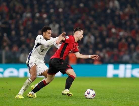 Group K European qualification football match between Albania and England in Tirana, Albania. - 15 November 2025. Albania s Arber Hoxha (R) fights for the ball with England s Jarell Quansah (L) during the FIFA World Cup, WM, Weltmeisterschaft, Fussball 2026 European qualification football match between Albania and England at the Air Albania stadium in Tirana, on November 16, 2025. TIRANA ALBANIA Copyright: xMALTONxDIBRAx