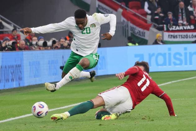 (251117) -- BUDAPEST, Nov. 17, 2025 -- Chiedozie Ogbene (L) of Ireland vies with Attila Szalai of Hungary during the FIFA World Cup, WM, Weltmeisterschaft, Fussball 2026 European qualifiers football match between Hungary and Ireland in Budapest, Hungary, on Nov. 16, 2025. (Photo by Xinhua) (SP)HUNGARY-BUDAPEST-FOOTBALL-2026 WORLD CUP EUROPEAN QUALIFIERS-HUNGARY VS IRELAND AttilaxVolgyi 