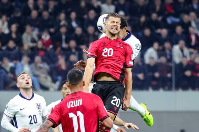 November 16, 2025, Tirana, Tirana, Albania: Ylber Ramadani of Albania and Ezri Konsa of England fight for the ball during their FIFA World Cup, WM, Weltmeisterschaft, Fussball 2026 qualifier match between Albania and England in Tirana, Albania on 16 November 2025. Tirana Albania - ZUMAb266 20251116_zip_b266_003 Copyright: xArmandoxBabanix