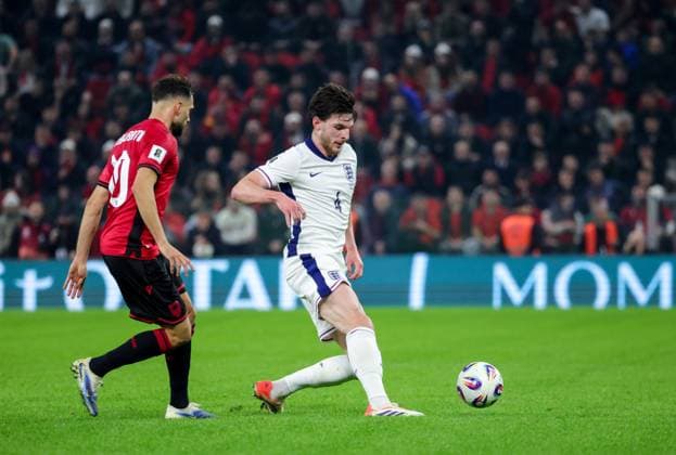 November 16, 2025, Tirana, Tirana, Albania: Nedim Bajrami of Albania and Declan Rice of England fight for the ball during their FIFA World Cup, WM, Weltmeisterschaft, Fussball 2026 qualifier match between Albania and England in Tirana, Albania on 16 November 2025. Tirana Albania - ZUMAb266 20251116_zip_b266_004 Copyright: xArmandoxBabanix