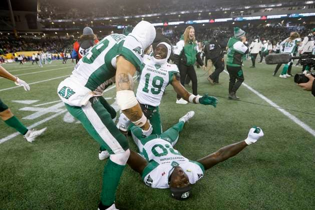 November 16, 2025, Winnipeg, Mb, CANADA: Saskatchewan Roughriders Ajou Ajou (80) and teammates Saskatchewan Roughriders Kian Schaffer-Baker (89) and Saskatchewan Roughriders Samuel Emilus (19) celebrate their 25-17 win over the Montreal Alouettes following second half CFL football action at the 112th Grey Cup, in Winnipeg on Sunday, Nov. 16, 2025. Canada News - November 16, 2025  - ZUMAc35_ 20251116_zaf_c35_199 Copyright: xJohnxWoodsx