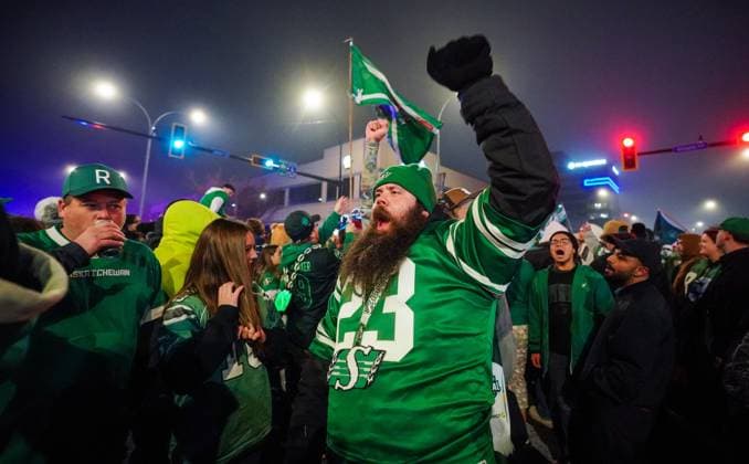 November 16, 2025, Regina, Sk, Canada: A person cheers in a street party after the Saskatchewan Roughriders defeat the Montreal Alouettes in the 112th Grey Cup in Regina, Sunday, Nov. 16, 2025. Canada News - November 16, 2025  - ZUMAc35_ 20251116_zaf_c35_205 Copyright: xHeywoodxYux