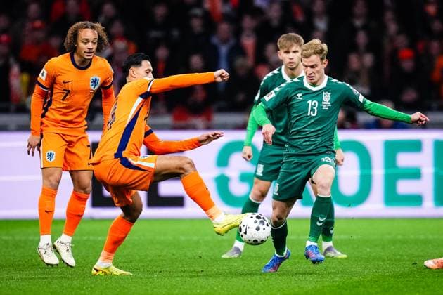 World Cup qualification: The Netherlands v Lithuania Amsterdam - Tijani Reijnders of The Netherlands, Justas Lasickas of Lithuania during the qualification match for the World Cup 2026. The match is set between The Netherlands and Lithuania at Johan Cruyff Arena on 17 November 2025 in Amsterdam, The Netherlands. (VK Sportphoto Yannick Verhoeven) Copyright: xYannickxVerhoevenx