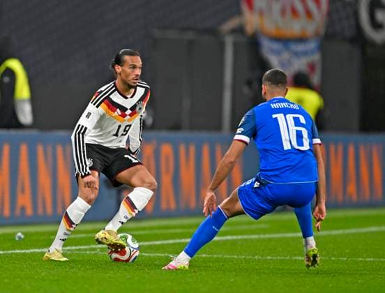 17 11 2025, Football World Cup Qualification Europe 2025 26, Matchday 10, Germany Slovakia, at Red Bull Arena Leipzig Germany v l Leroy Sane Germany v David Hancko Slovakia