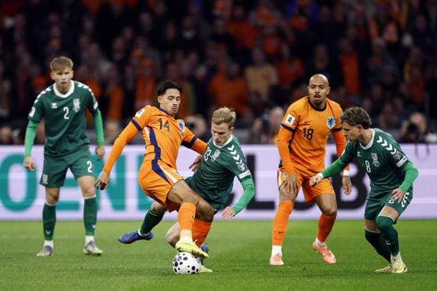 AMSTERDAM (l-r) Tijjani Reijnders of the Netherlands, Justas Lasickas of Lithuania during the World Cup qualifying match between the Netherlands and Lithuania at the Johan Cruijff ArenA on November 17, 2025, in Amsterdam, Netherlands. ANP MAURICE VAN STEEN FIFA 2026 World Cup Qualifier 2025-2026 xVIxANPxSportx xxANPxIVx 542367111 originalFilename: 542367111.jpg