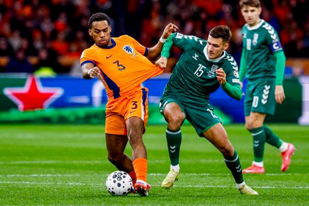 Jurrien Timber of the Netherlands and Gvidas Gineitis of Lithuania battle for the ball Netherlands v Lithuania, FIFA World Cup, WM, Weltmeisterschaft, Fussball 2026 Qualifier, Netherlands v Lithuania, Johan Cruijff Arena, November 17, 2025, Amsterdam, Netherlands.