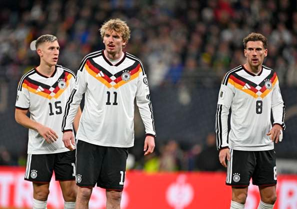 17 11 2025, Football World Cup Qualification Europe 2025 26, Matchday 10, Germany Slovakia, at the Red Bull Arena Leipzig Germany f l Nico Schlotterbeck Germany , Nick Woltemade Germany and Leon Goretzka Germany pensive