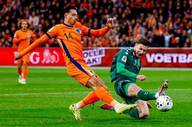 Tijjani Reijnders of the Netherlands shoots under pressure from Edgaras Utkus of Lithuania and scores the 1-0 Netherlands v Lithuania, FIFA World Cup, WM, Weltmeisterschaft, Fussball 2026 Qualifier, Netherlands v Lithuania, Johan Cruijff Arena, November 17, 2025, Amsterdam, Netherlands.
