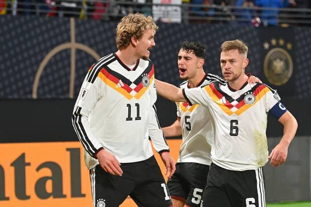 Goal celebration Nick WOLTEMADE GER after goal at 1 0 with Joshua KIMMICH GER and Aleksandar PAVLOVIC GER cheering,joy,enthusiasm,,action soccer international match, World Cup Qualification Group A Matchday 06, Germany GER Slovakia SVK on 17 11 2025, RED BULL ARENA Â