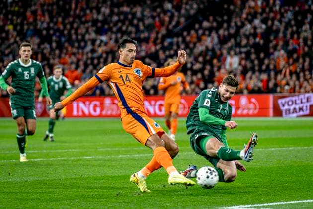 Netherlands midfielder Tijjani Reijnders, Lithuania defender Edgaras Utkus, during the match FOOTBALL EUROPEAN QUALIFIERS NETHERLANDS LITHUANIA at the Johan Cruijff ArenA for the FIFA World Cup 2026 UEFA Qualifiers Group G Matchday 10 season 2025 2026 in AMSTERDAM, Netherlands on 17 november 2025, photo by Stefan Koops EYE4images DeFodi Images