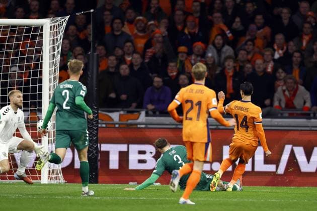 AMSTERDAM - Tijjani Reijnders of Netherlands (14) scores the 1-0 during the World Cup qualifying match between Netherlands and Lithuania at the Johan Cruijff ArenA on November 17, 2025 in Amsterdam, Netherlands. ANP MAURICE VAN STEEN FIFA 2026 World Cup Qualifier 2025-2026 xVIxANPxSportx xxANPxIVx 542368424 originalFilename: 542368424.jpg