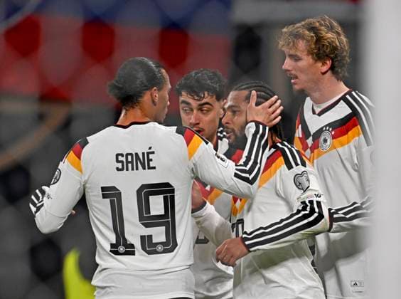 17 11 2025, Football World Cup Qualification Europe 2025 26, Matchday 10, Germany Slovakia, at the Red Bull Arena Leipzig Germany v l Leroy Sane Germany Aleksandar Pavlovic Germany , Serge Gnabry Germany and Nick Woltemade Germany cheer