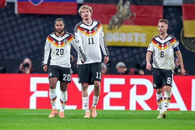 17 11 2025, Football, International match, World Cup Qualification Europe, Germany Slovakia, Red Bull Arena Leipzig , Matchday 10, Season 2025 2026 Goal celebration after the goal to 2 0 by scorer Serge Gnabry GER 20 together with Nick Woltemade GER 11 Regulations prohibit any use of photographs as image sequences and or quasi video Sachsen Deutschland