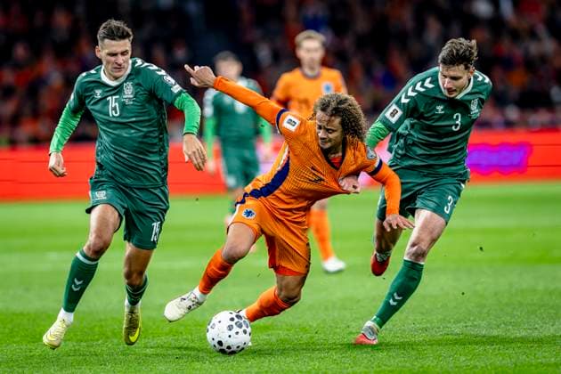 Lithuania midfielder Gvidas Gineitis, Netherlands midfielder Xavi Simons, Lithuania defender Edgaras Utkus, during the match FOOTBALL EUROPEAN QUALIFIERS NETHERLANDS LITHUANIA at the Johan Cruijff ArenA for the FIFA World Cup 2026 UEFA Qualifiers Group G Matchday 10 season 2025 2026 in AMSTERDAM, Netherlands on 17 november 2025, photo by Stefan Koops EYE4images DeFodi Images