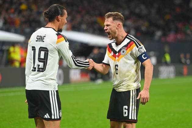 Goal celebration Leroy SANE GER with Joshua KIMMICH GER , Cheering,Joy,Enthusiasm,Action Soccer international match, World Cup Qualification Group A Matchday 06, Germany GER Slovakia SVK on 17 11 2025, RED BULL ARENA