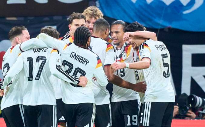Leroy Sane of Germany celebrates his her goal, happy, laugh, celebration, 3-0 with Nick Woltemade of Germany Leon Goretzka of Germany in the FIFA World Cup, WM, Weltmeisterschaft, Fussball 2026 qualifier match GERMANY - SLOVAKIA in Season 2025 2026 at November 17, 2025 in Leipzig, Germany.