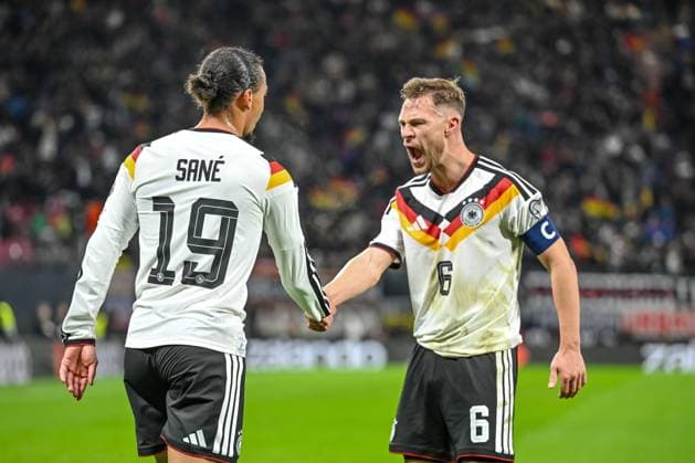 Leroy Sane Germany celebrates after scoring his team s third goal with teammates during the FIFA World Cup 2026 qualifier match between Germany and Slovakia at Red Bull Arena on November 17, 2025 in Leipzig, Germany Photo by Harry Langer DeFodi Images