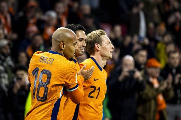 AMSTERDAM (l-r) Donyell Malen of the Netherlands, Tijjani Reijnders of the Netherlands, and Frenkie de Jong of the Netherlands celebrate the 1-0 goal during the World Cup qualifying match between the Netherlands and Lithuania at the Johan Cruijff ArenA on November 17, 2025, in Amsterdam, Netherlands. ANP KOEN VAN WEEL FIFA 2026 World Cup Qualifier 2025-2026 xVIxANPxSportx xxANPxIVx 542369180 originalFilename: 542369180.jpg