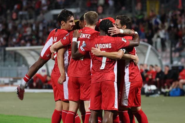 Malta national team, Nationalteam players celebrate after Irvin Cardona (not in picture) of Malta scored the 1-1 goal during the FIFA World Cup, WM, Weltmeisterschaft, Fussball 26 UEFA European Qualifier Group G match between Malta and Poland, at the National Stadium, in Ta Qali, Malta, 17 November 2025. FIFA World Cup 26 Qualifiers - Malta vs Poland
