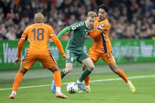 AMSTERDAM, 17-11-2025, Johan Cruijff ArenA , season 2025 2026 , FIFA World Cup, WM, Weltmeisterschaft, Fussball Qualifier football , match between The Netherlands and Lithuania. Pictures shows Netherlands player Donyell Malen, Lithuania player Justas Lasickas, Netherlands player Tijjani Reijnders Netherlands - Lithuania x32076512x Copyright: