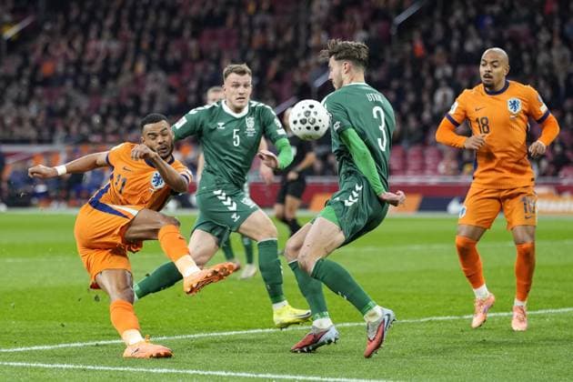AMSTERDAM, 17-11-2025, Johan Cruijff ArenA , season 2025 2026 , FIFA World Cup, WM, Weltmeisterschaft, Fussball Qualifier football , match between The Netherlands and Lithuania. Pictures shows Netherlands player Cody Gakpo, Lithuania player Edgaras Utkus Netherlands - Lithuania  x32076714x Copyright: