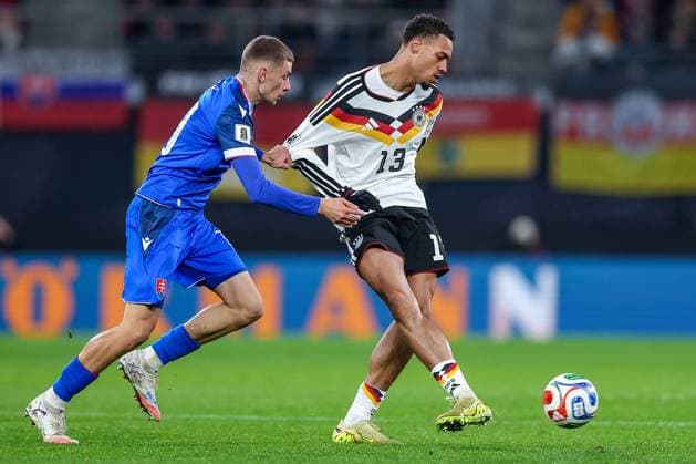 17 11 2025, Football, International match, World Cup Qualification Europe, Germany Slovakia, Red Bull Arena Leipzig , Matchday 10, Season 2025 2026 Felix Nmecha GER 13 in duel Regulations prohibit any use of photographs as image sequences and or quasi video Saxony Germany