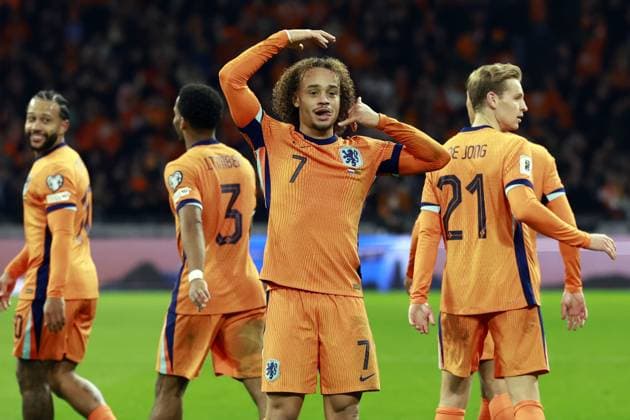 AMSTERDAM - Xavi Simons of the Netherlands celebrates scoring the 3-0 goal during the World Cup qualifying match between the Netherlands and Lithuania at the Johan Cruijff ArenA on November 17, 2025 in Amsterdam, Netherlands. ANP MAURICE VAN STEEN FIFA 2026 World Cup Qualifier 2025-2026 xVIxANPxSportx xxANPxIVx 542372411 originalFilename: 542372411.jpg